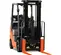 Front view of orange and black warehouse forklift with black lifting mast and orange forks with an open cabin.