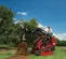 Cargador sobre orugas compacto de 600 – 1,100 lb TORO rojo y negro