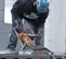 Sierra de corte para concreto, 9 in, a gasolina HUSQVARNA naranja, negra y plateada