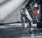 Sierra de corte para concreto de 14 pulgadas, a gasolina HUSQVARNA naranja, negra y gris