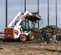 Cargador compacto de 1,700 – 1,900 lb BOBCAT blanco, negro y naranja