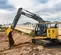 Orange, gray and black JOHN DEERE 30,000-35,000 lb. Excavator, Zero Tail Swing