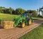 Green John Deere farm tractor