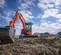 Orange and black KUBOTA 12,000-14,000 lb. Mini Excavator, Reduced Tail Swing