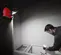 Red and black Milwaukee portable LED light