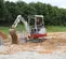 Red, white and gray TAKEUCHI 3,000-3,999 lb. Mini Excavator, Zero Tail Swing
