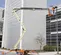 Beige and orange JLG Boom