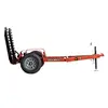 Remolque Ditch Witch naranja para una zanjadora manual con rampa hacia arriba