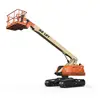 Side angled view of an orange and beige JLG Lift boom lift with extended arm and basket.