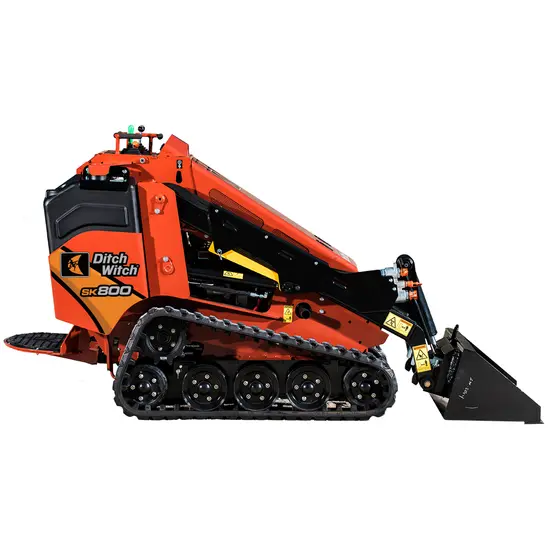 Cargador sobre orugas compacto de 600 – 1,100 lb DITCHWITCH naranja y negro
